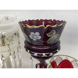 Bohemian red glass lustre, painted with stylised floral and foliate decoration, together with a milk glass example and two bohemian goblets converted to lustres 