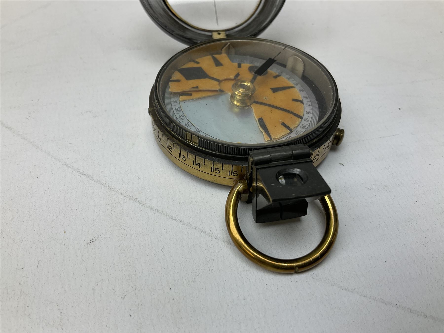 Two WW1 verniers pattern marching compasses, one dated 1917 in leather case impressed French & Son with manuscript details Major I.R. Edwards Mon. Regt., the other inscribed J.H. Steward 1903 in leather case with manuscript details G.L. Stirling Barnsley; four WW1 linen backed folding maps of Palestine and Telfit; another WW2 map of Swansea and Aberdare; and quantity of military and other postcards