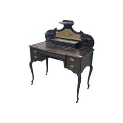 19th century French mahogany kneehole dressing table, raised mirrored gallery back with three small shelves and central hinged compartment, inset leather surface, two short drawers to each side, raised on slender cabriole supports with acanthus carved knees