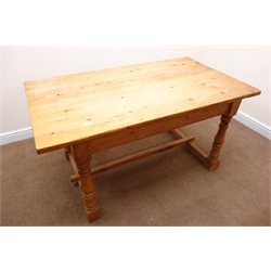  Rectangular country kitchen style pine dining table, turned supports joined by single stretcher, W150cm, H76cm, D87cm  