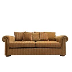 Duresta - 'Waldorf' sofa bed, traditional shape with rolled arms upholstered in red and gold striped fabric, together with scatter cushions upholstered in foliage pattern fabric