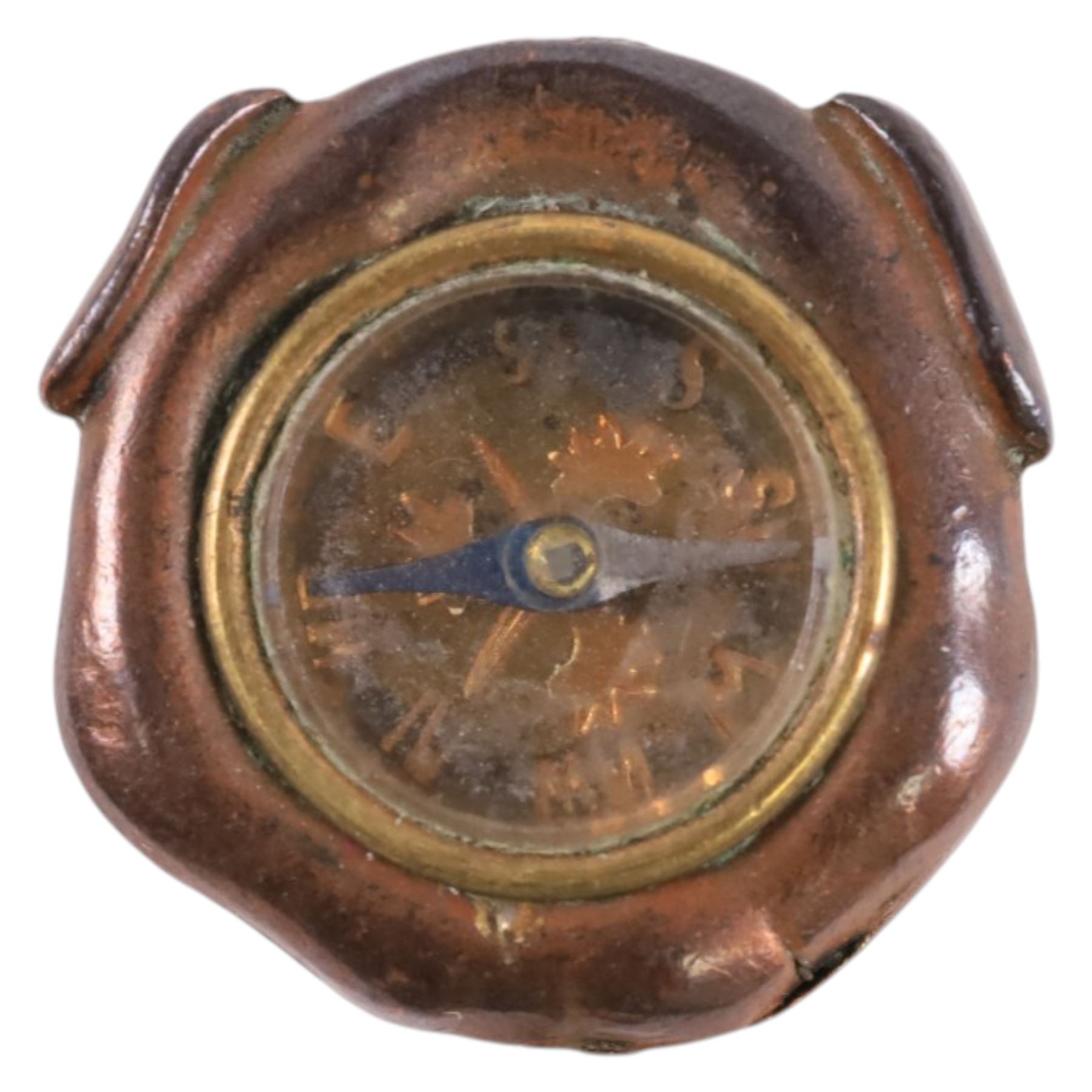 Small Japanese copper compass, modelled as the mask of a dog, H2cm