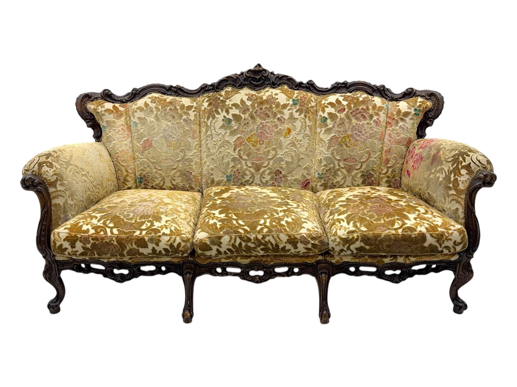 Victorian design stained wood three seater settee, top rail carved and scrolled, padded back and arms, scrolled cabriole feet 