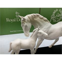 Five Beswick and Royal Doulton horse figures in matt white on black plinths, comprising of  Spirit of Affection no. 2689/2536, Springtime no.2837, Spirit of peace no.2916, Spirit of earth no.2914 and Spirit of the wild no. 183, together with a composite figure of a horse (6)