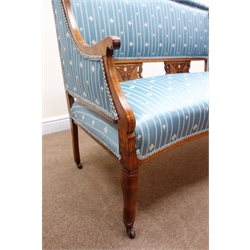  Edwardian inlaid mahogany framed two seat sofa, upholstered in a blue striped fabric, scrolled arms, cabriole legs, W130cm  