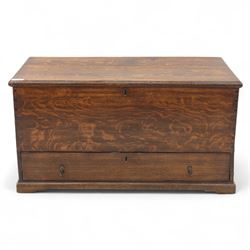19th century oak blanket chest, rectangular hinged plank top with moulded edge, plain sides fitted with iron carrying handles, single full-width drawer to base with brass drop handles, on moulded plinth base