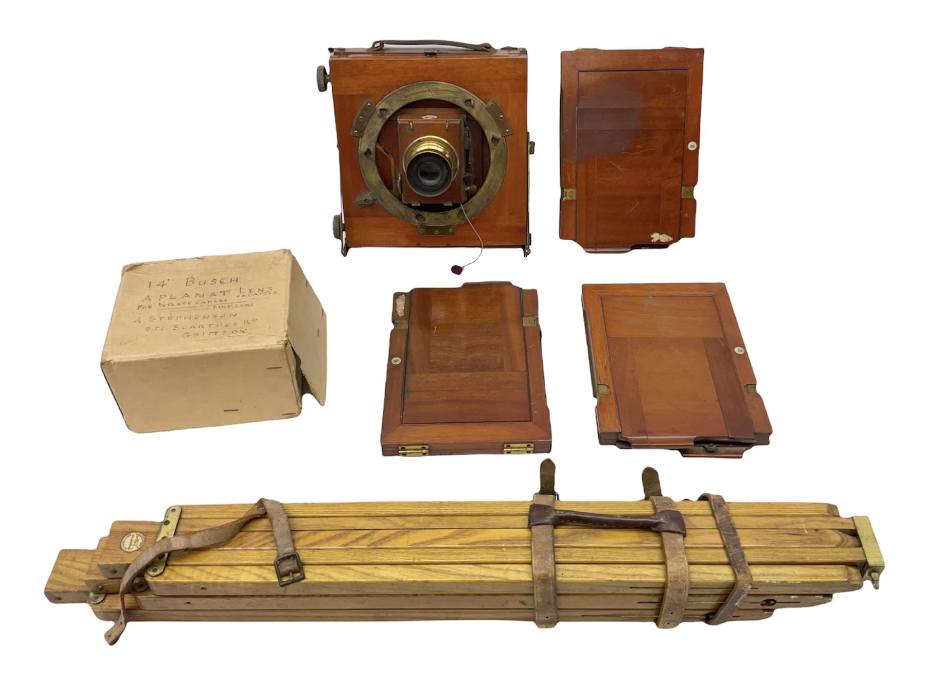 Thornton Pickard Imperial Triple folding plate camera in mahogany and lacquered brass, field model, three mahogany photographic plates and a wooden tripod