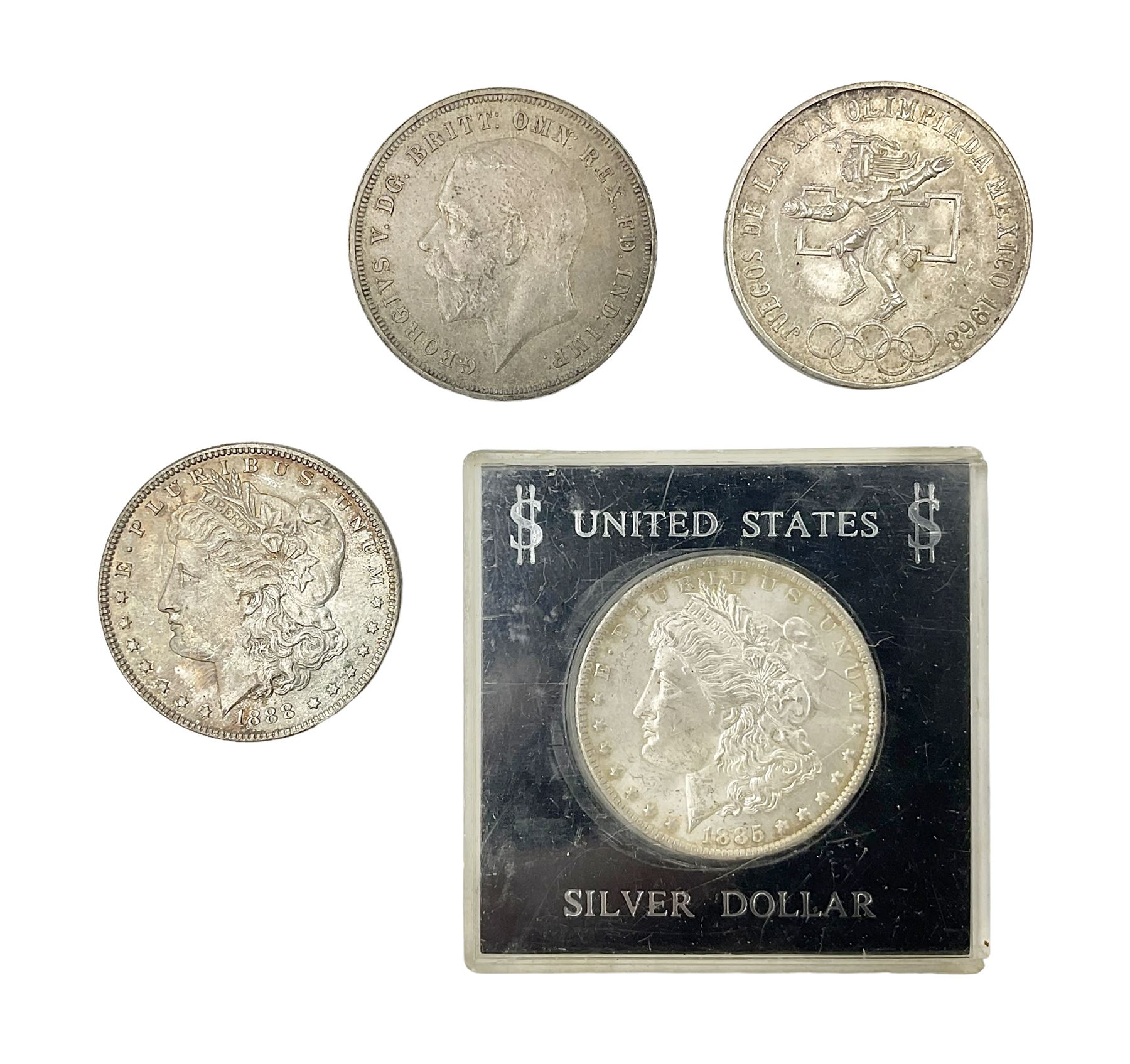Two United States of America silver Morgan dollars dated 1885 O, 1888 O, King George V 1935 crown coin, and Mexico 1968 twenty-five pesos coin