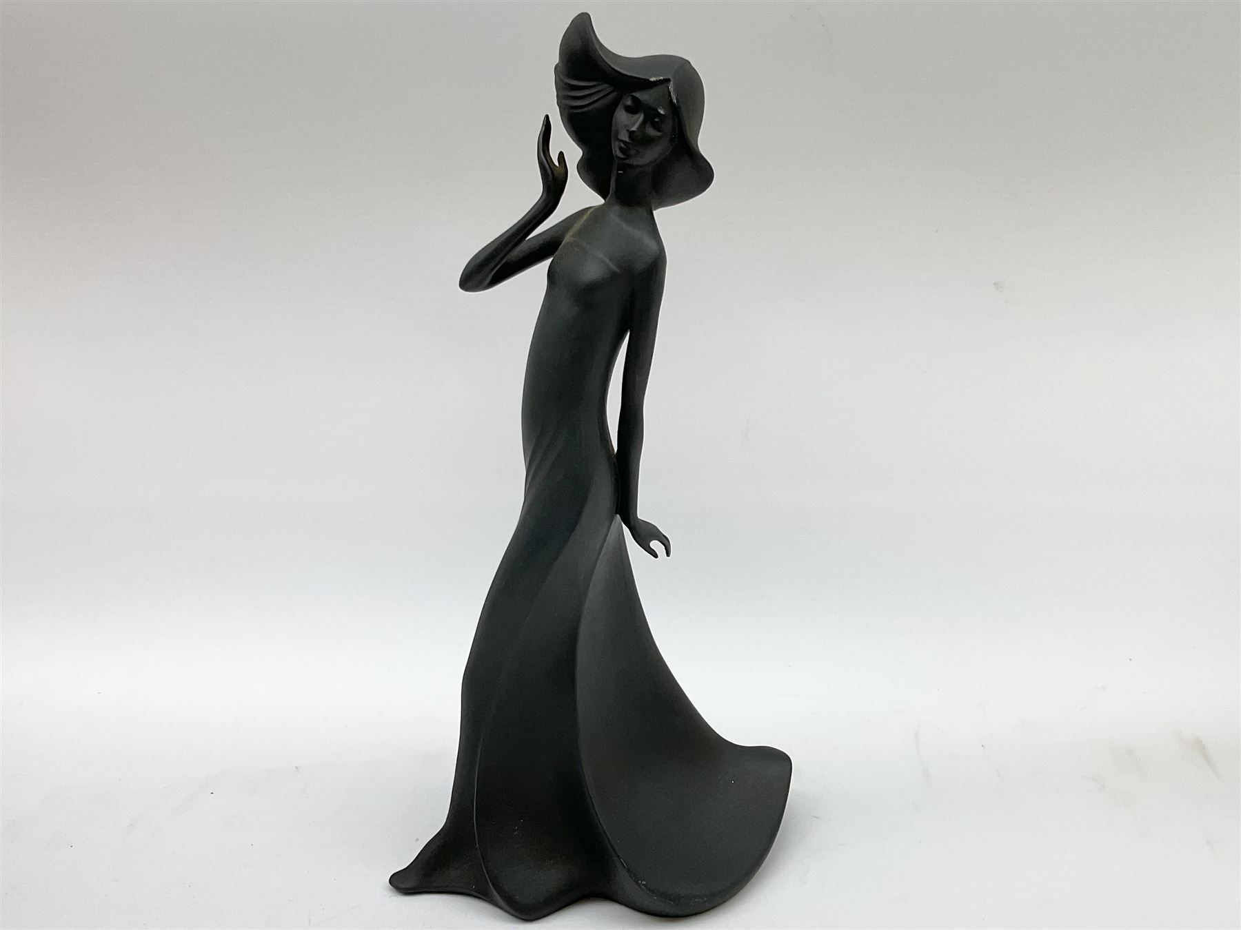 Four Royal Doulton Images figures comprising 'Happy Anniversary', 'Wedding Day', 'Congratulations' and 'Carefree', together with a set of three Heinrich collectors plates depicting Fairies.