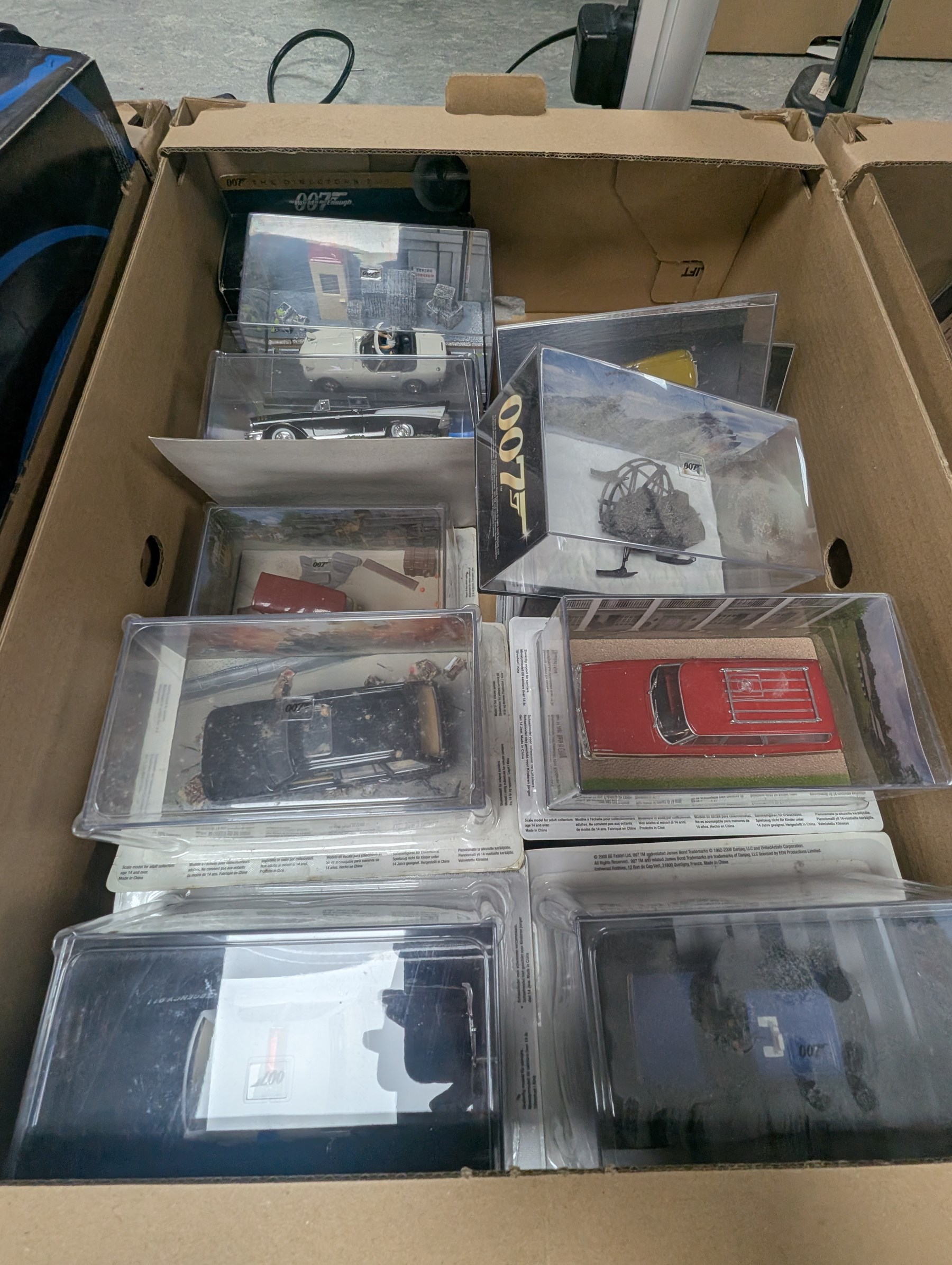 Large collection of James Bond 007 diecast model vehicles, mostly GE Fabbri, and a collection of associated magazines, in five boxes