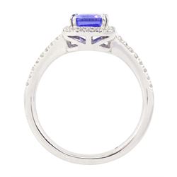 Platinum tanzanite and diamond cluster ring, single emerald cut tanzanite of approx 1.75 carat, with round brilliant cut diamond surround and split diamond set shoulders, signed Rhapsody, hallmarked, total diamond weight approx 0.20 carat