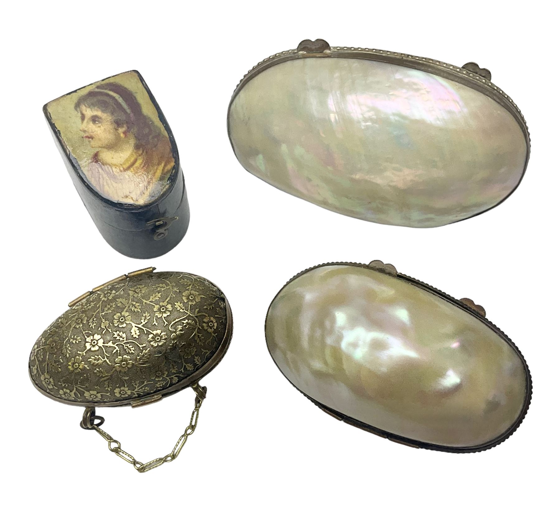 19th century lacquer thimble case with painted portrait of a woman to the hinged lid, together with two mother of pearl egg shaped thimble cases and one other