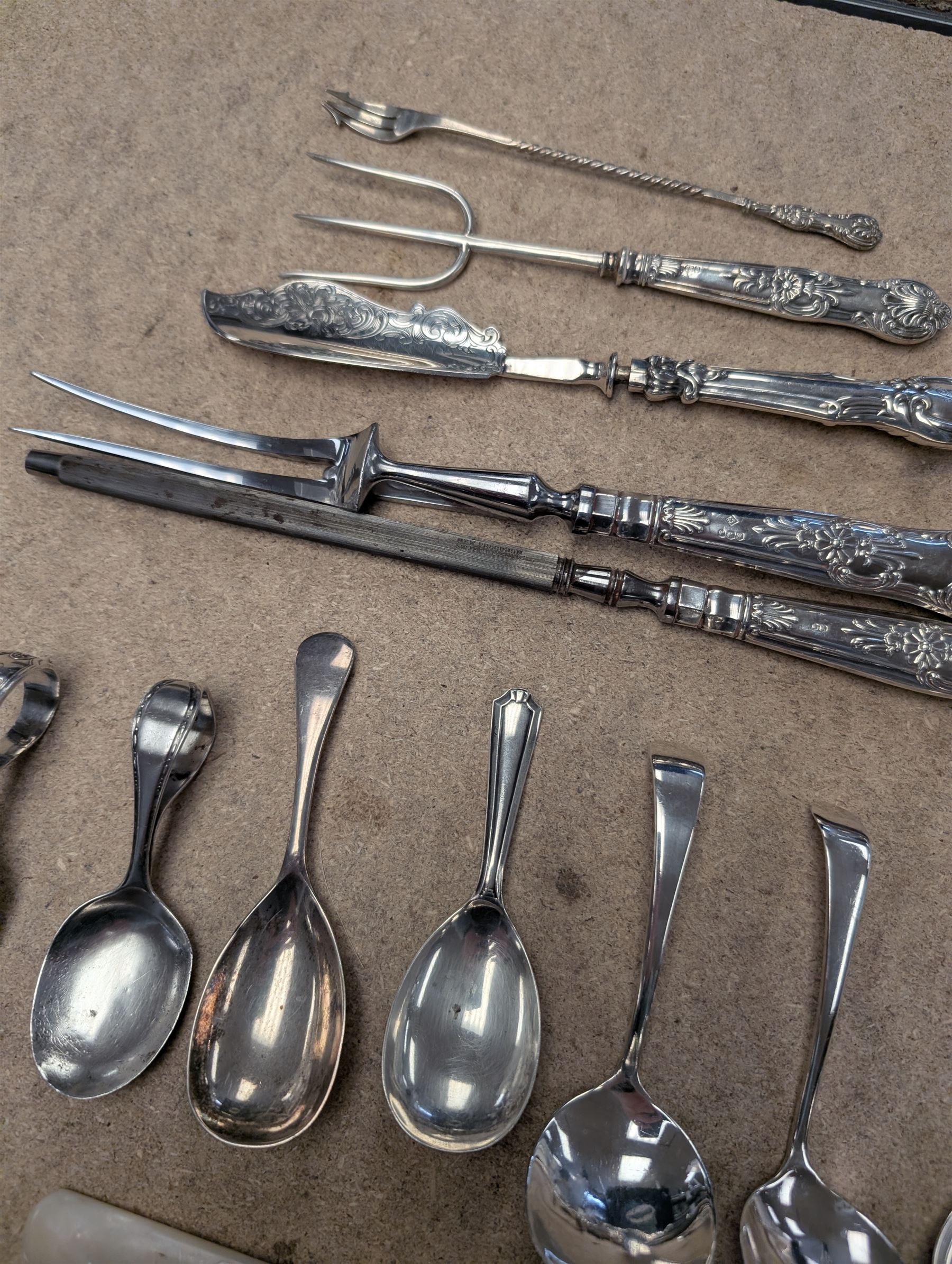 Group of silver and silver handled cutlery, including caddy spoons, thimble, propelling pencil, fruit knife, etc, all stamped or hallmarked