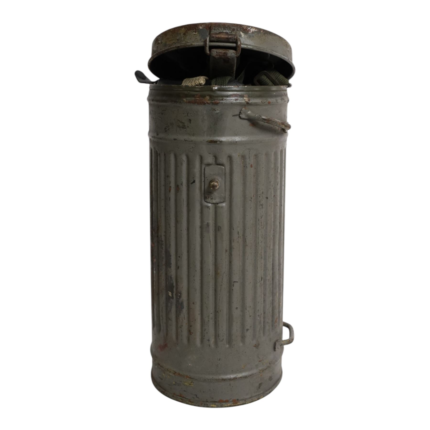 WWII German armed forces gas mask, housed in the original issue tin, tin H27cm