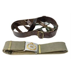 British Army Officers Sam Browne leather belt with shoulder strap; and webbing belt with Potter London Staybrite buckle for 19th Regiment of Foot (Green Howards) with various markings (2)