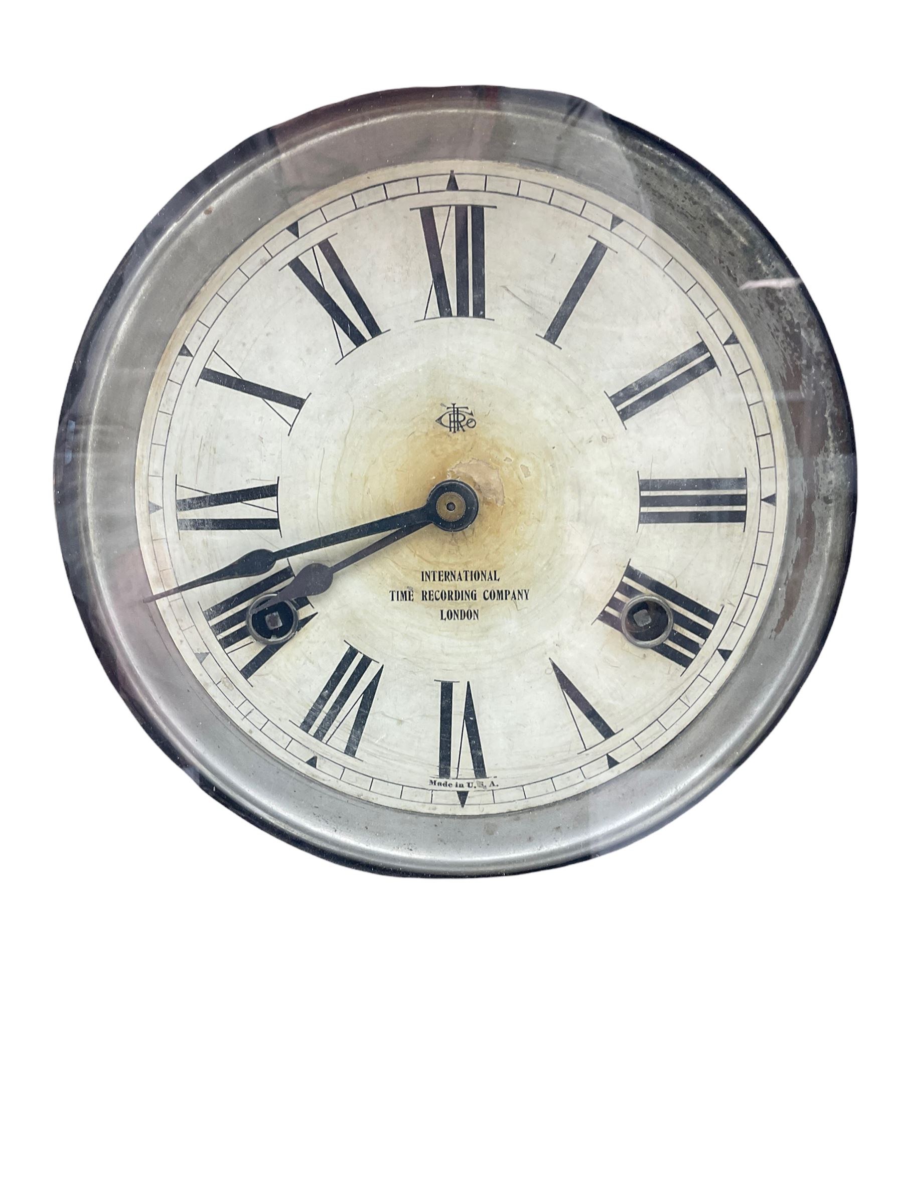 An early 20th century time recording clock (clocking in machine