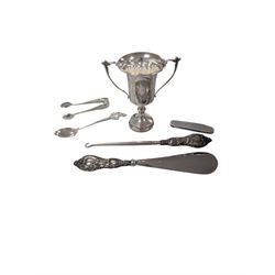 Small collection of silver comprising trophy, fruit knife, spoon, sugar tongs and silver handled hook and shoe horn, together with a silverplated epergne and other metalware