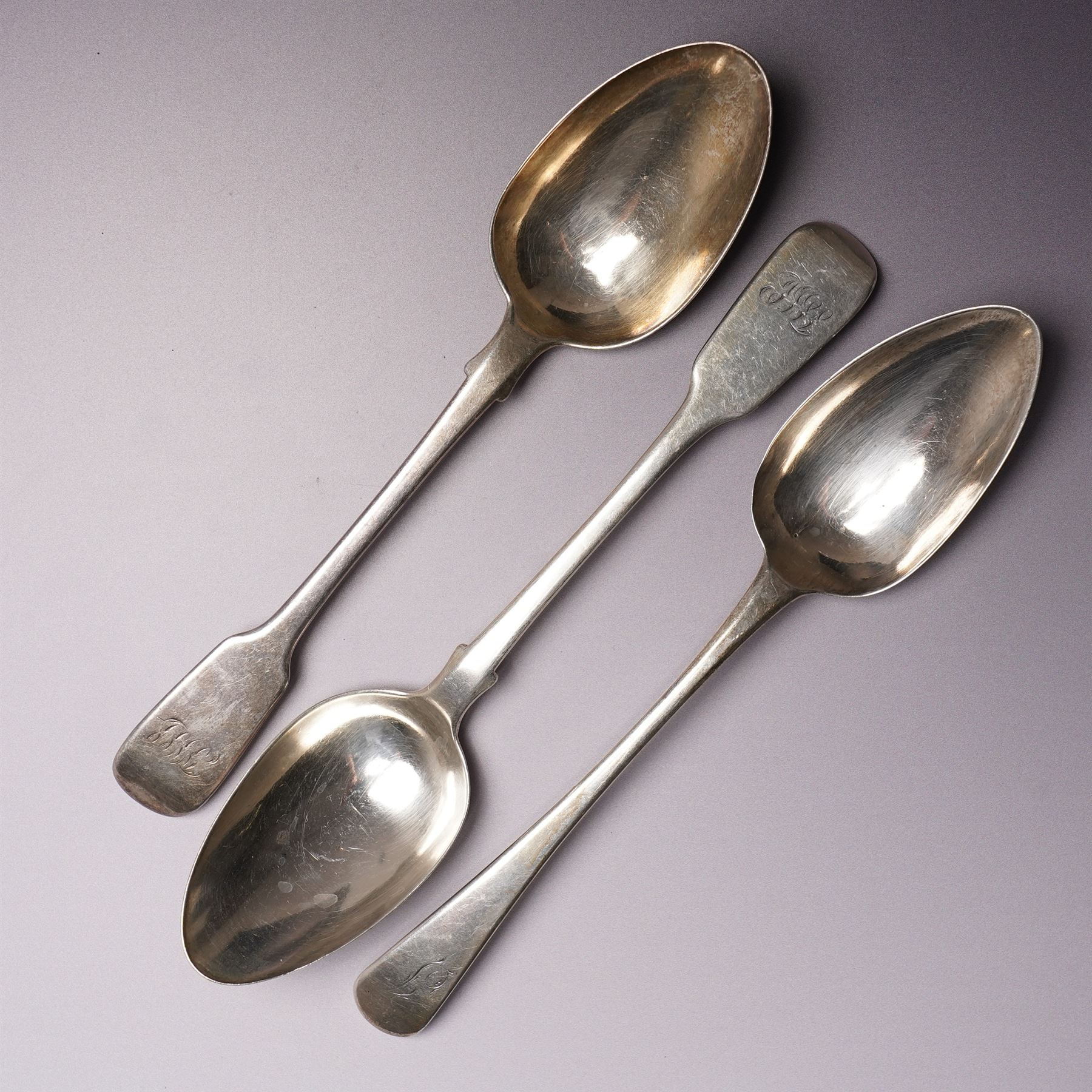 Pair of Victorian silver fiddle pattern table spoons London 1844 Maker James & Albert Savory, George III table spoon by Peter and Ann Bateman, engraved silver caddy spoon Birmingham 1810 Maker Samuel Pemberton and three other silver items 