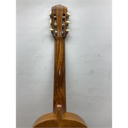 Encore black electric cut-away guitar L96cm; and Spanish Victor Garcia model 187 acoustic guitar, bears label dated 1972 L99cm; each in soft carrying case (2)