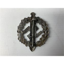 Two WW2 German Sports badges - SA sports badge marked verso 'W.Redo Eigentum D. Obersten SA. Fuhrung Saar Lautern'; and DRL sports badge marked verso 'Wernstein Jena D.R.G.M. 35269' (2)