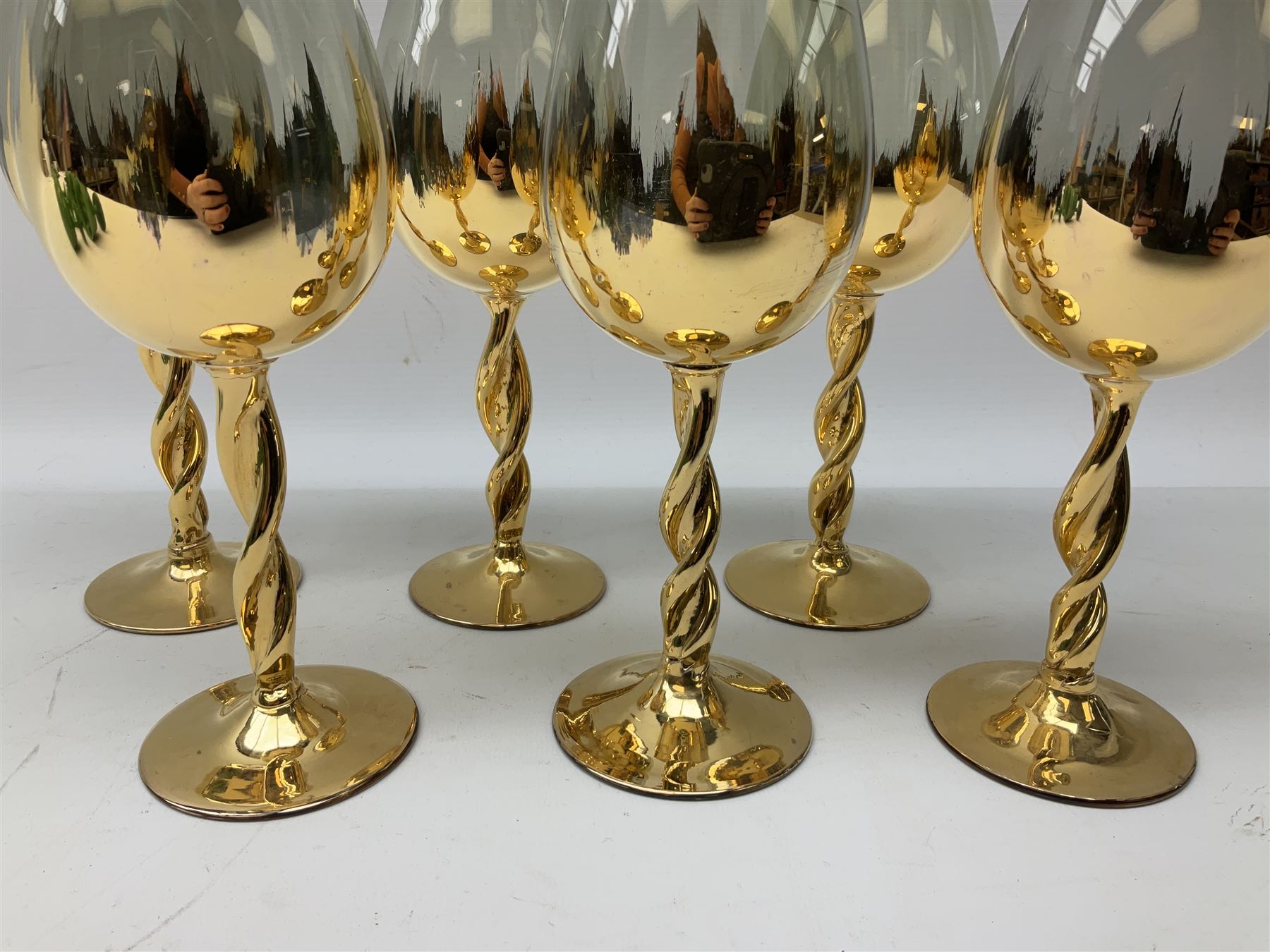Set of six Art Deco style green glass sundae dishes, H9cm along with set of six Bohemian style glasses with twisted gilt stems