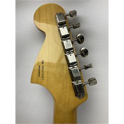 Mexican Fender Jaguar electric guitar with Humbucker pick-ups and tremolo arm, serial no.MX16741977, L101cm; in soft carrying case