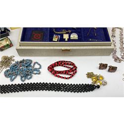 Costume jewellery including brooches, necklaces etc, housed in a modern jewellery box
