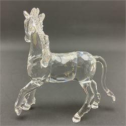 Swarovski Crystal animals, comprising white peacock, the tail with cascading blue flowers, perched eagle with yellow beak, ibex with frosted crystal horns and unicorn with frosted crystal horn, tallest H13cm