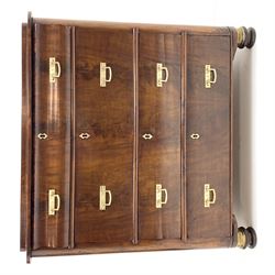 19th century figured mahogany chest, stepped rectangular top with quarter matched veneers and rounded corners, four graduating drawers separated by cushion moulding, the frieze drawer having a bombe shaped fascia, on turned feet with moulded gilt metal mounts