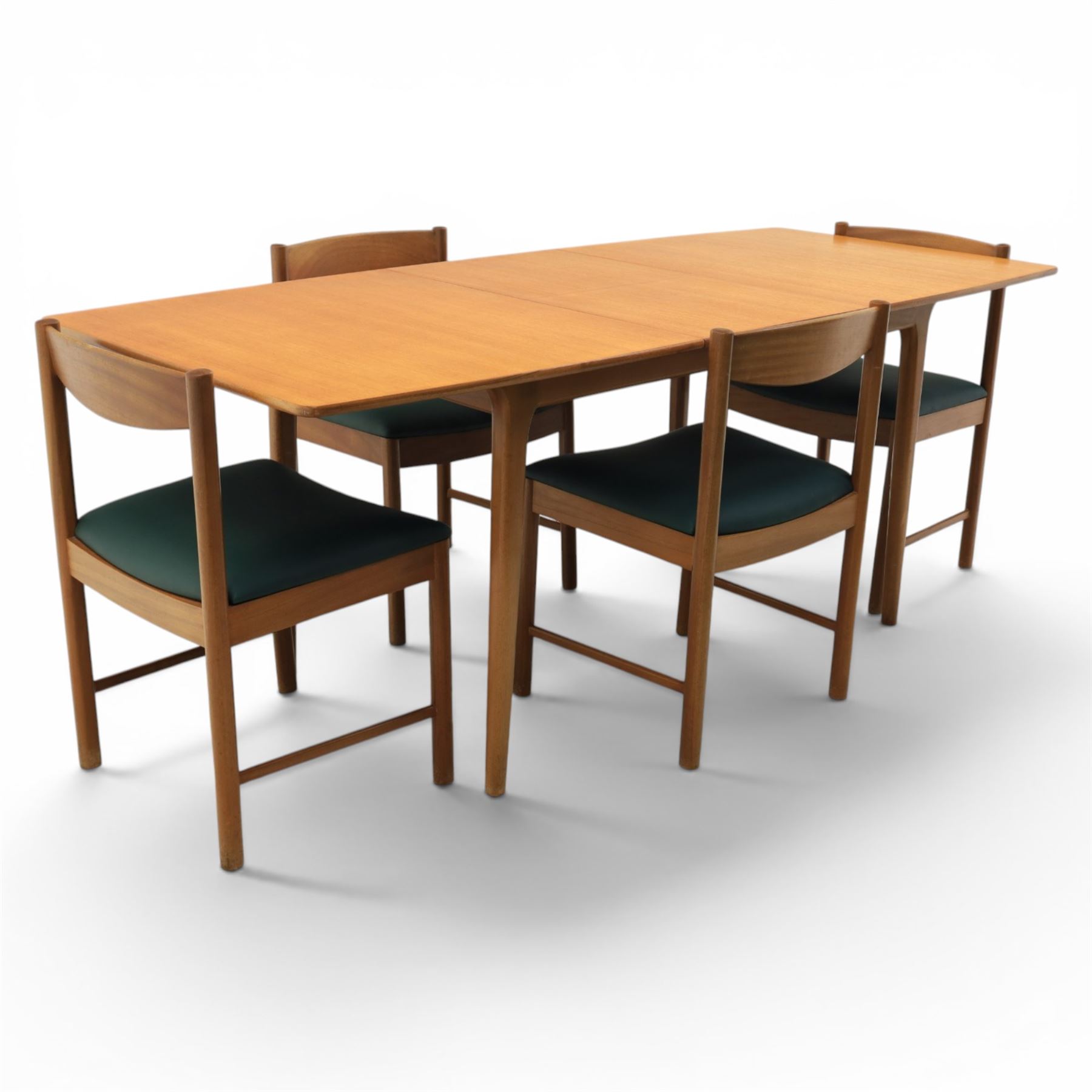 A.H. McIntosh - Mid-20th century teak extending dining table and four chairs, teak top table with internal fold over leaf extending to 193cm, raised on cylindrical tapering supports