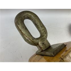 Three ship pulleys comprising wooden block double with swivel eye marked 'wooden block 240mm double rope: 22mm',  wooden block double with upset shackle and wooden block with stiff swivel hook, largest example L50cm