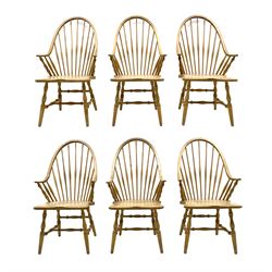Set six American style Windsor dining chairs, shaped hoop and stick backs, dished seats, turned supports joined by stretchers 