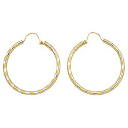 Pair of textured yellow gold and polished white gold hoop earrings, hallmarked 9ct