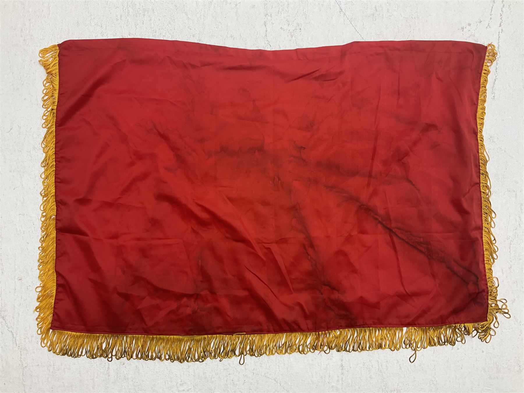 1960s North Vietnam banner embroidered in yellow thread on a red ground, roughly translates as 'Peoples Army of Viet Nam. Warriors of Viet Nam Determined To Keep The Country 1964' around a central military crest with the motto 'Warriors Keep The Country'; tassels to three sides 70 x 100cm