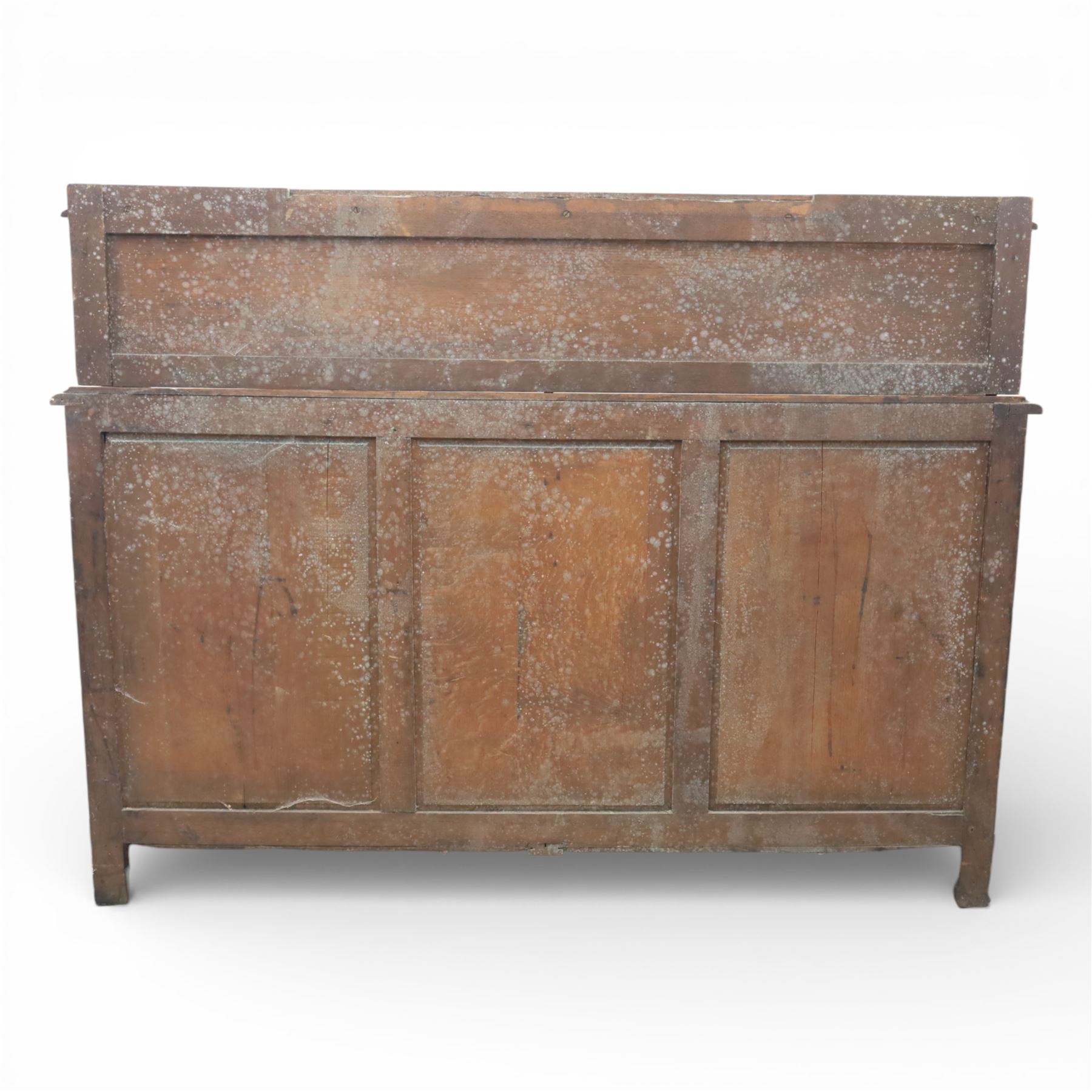 Victorian carved oak sideboard, the rectangular top with raised back carved with foliate scrolls and scroll end supports, upon a base with rectangular top with moulded edge, pair of drawers with conforming carved decoration and mask handles, and pair of carved cupboard doors, upon short stile type feet H101.5cm W183cm D54cm 