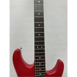 American Peavey Nitro 1 hand-made electric guitar in red with Kahler tremolo, serial no.02786479, L98cm overall; in soft carrying case.