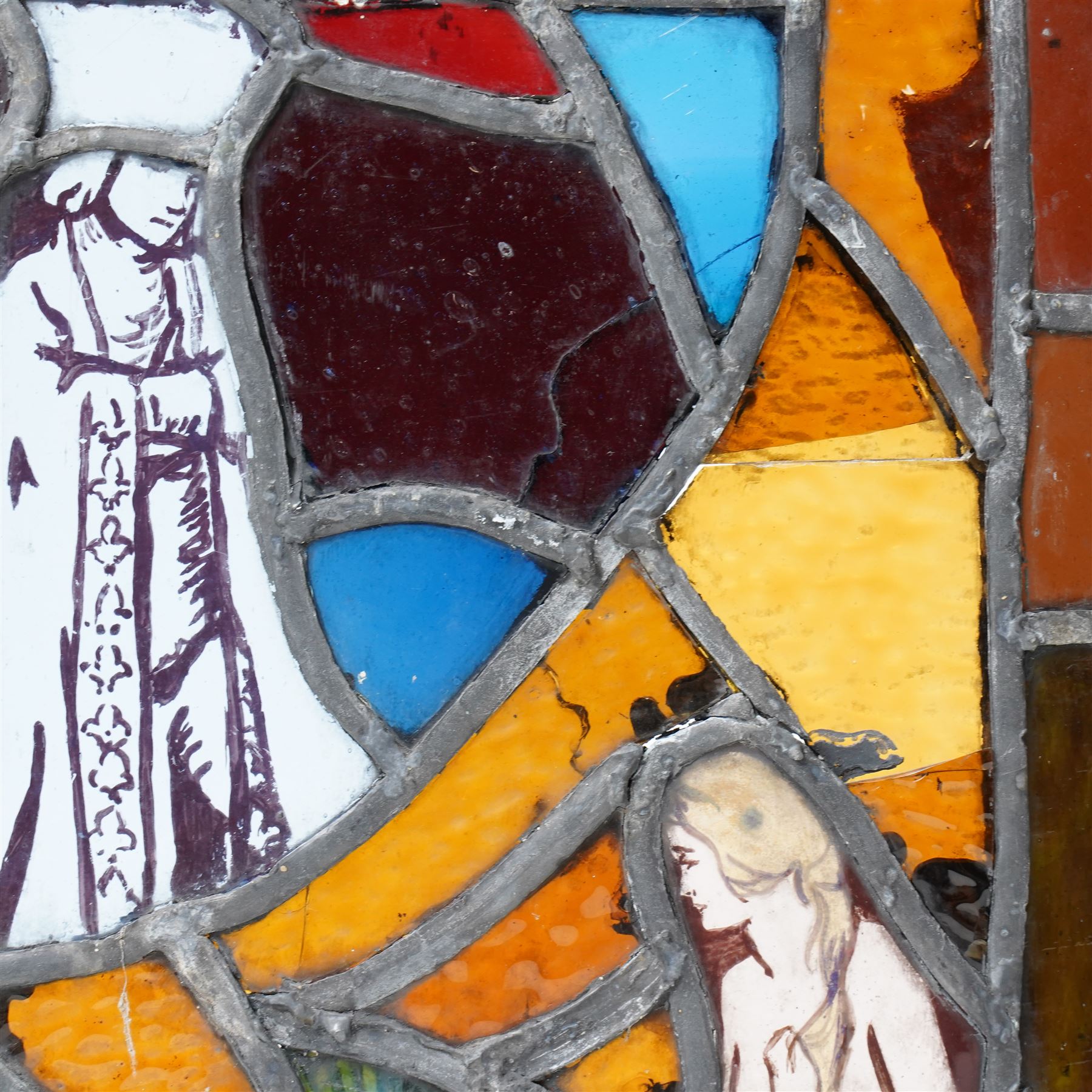 Arts & Crafts leaded stained glass panel depicting a painted seated siren or mermaid and a robed figure 31cm x 28cm