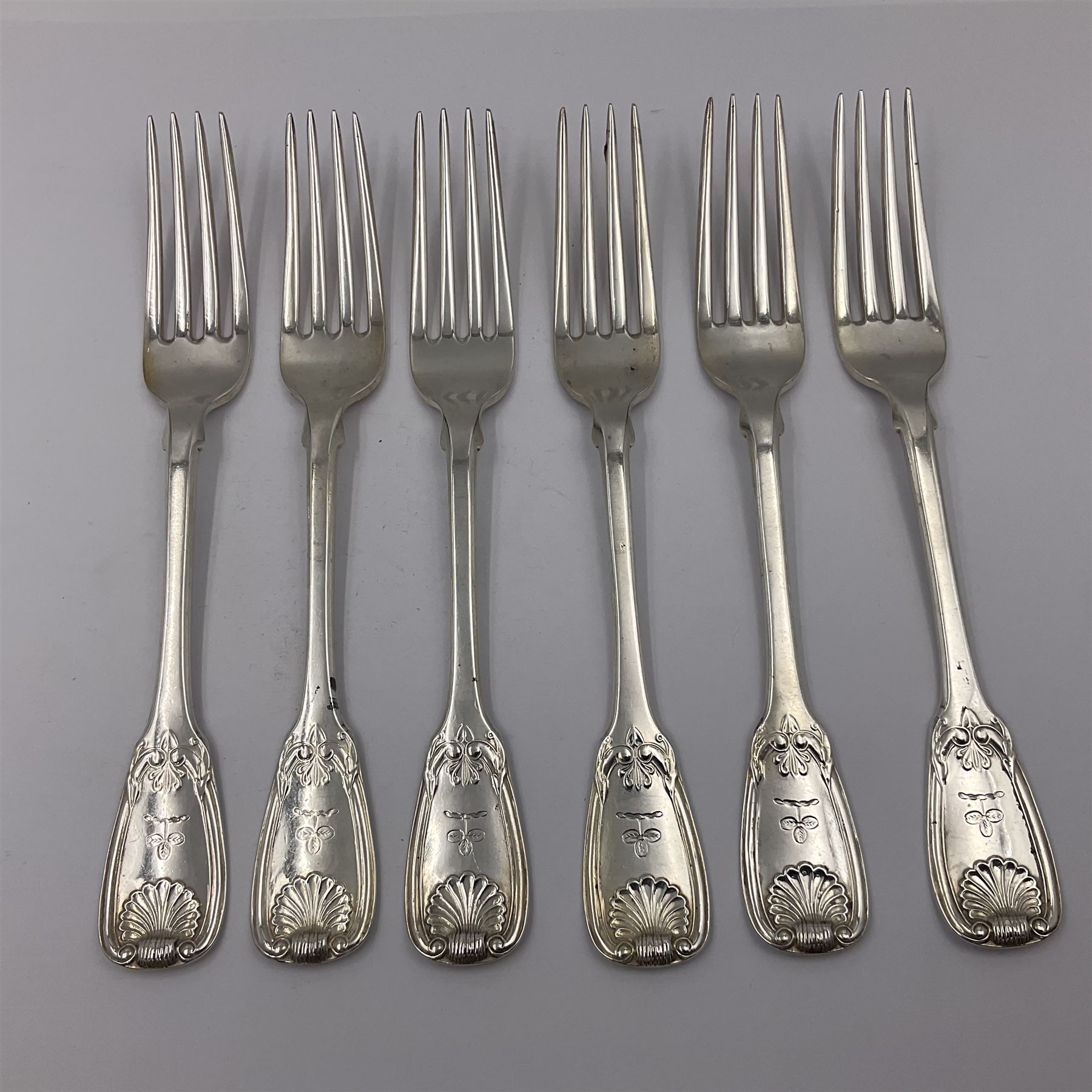 George IV Scottish silver Kings pattern cutlery for six place settings, to include table spoons, table forks, dessert spoons and dessert forks, all engraved with shamrock crest to terminal, hallmarked Robert Gray & Son, Glasgow 1833