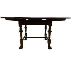 Early 20th century mahogany drawer leaf extending dining table, turned supports terminating with carved feet, joined by moulded stretchers 92cm x 92cm - 154cm, H78cm