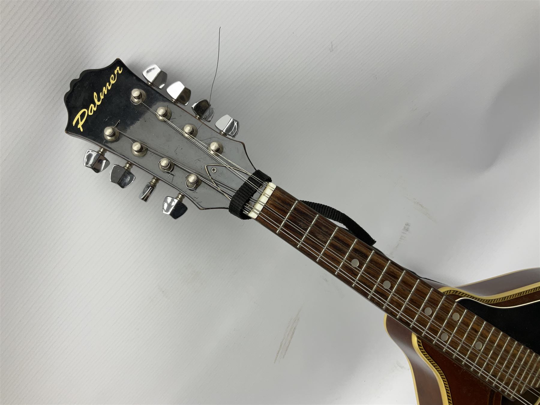 Palmer eight-string mandolin with mahogany back, simulated ivory and mother-of-pearl mounts L67cm; and Mahalo mahogany cased baritone scale ukulele, model no.U320B, L76cm; in hard carrying case (2)