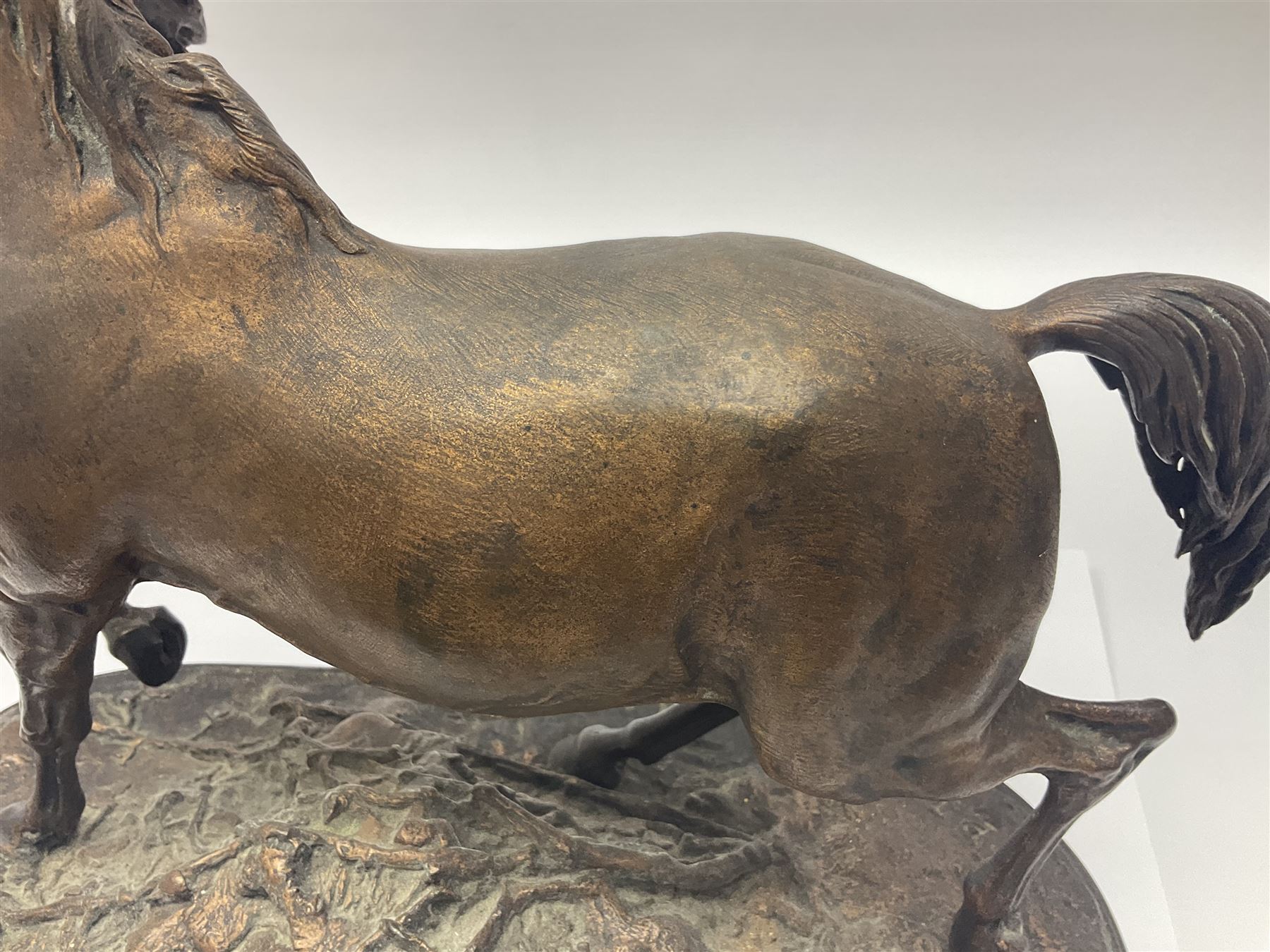 After P J Mene, bronze figure of a horse on a stepped oval base, H31cm 