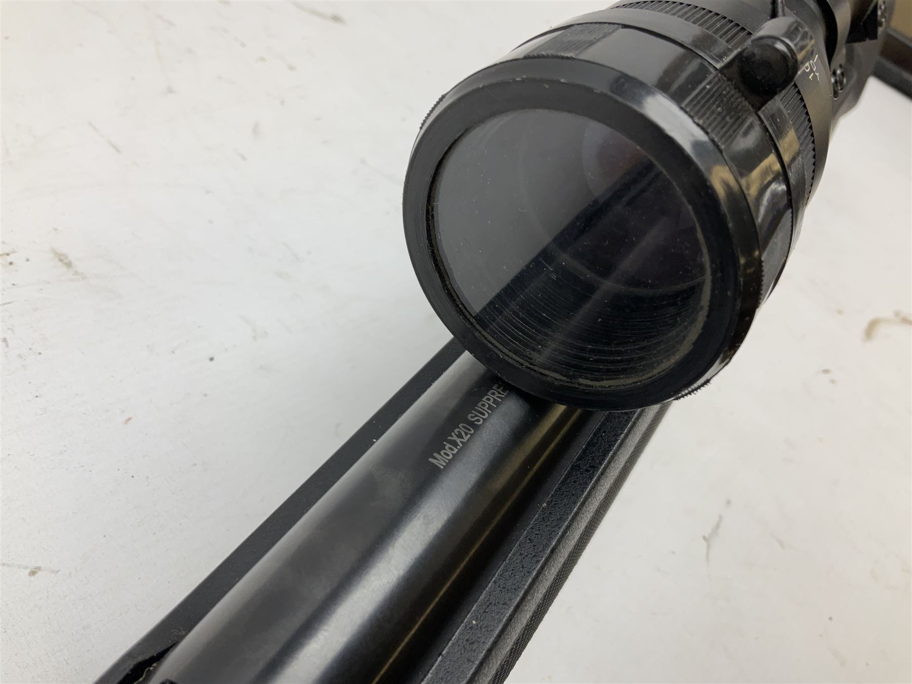 Stoegar .177 air rifle with break barrel action, 3 x 9 telescopic sight and fully integrated sound moderated barrel, no visible serial number, L109cm; in Stoeger lined gun sling