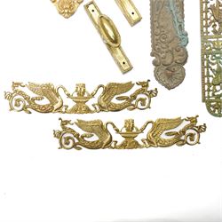 Large Victorian embossed brass door plate by Turner & Fowle with circular handle L63cm , pair of period design gilt brass door plates with oval handles, two more pairs of brass door plates and pair of brass door handles  
Provenance: property of a Nobleman