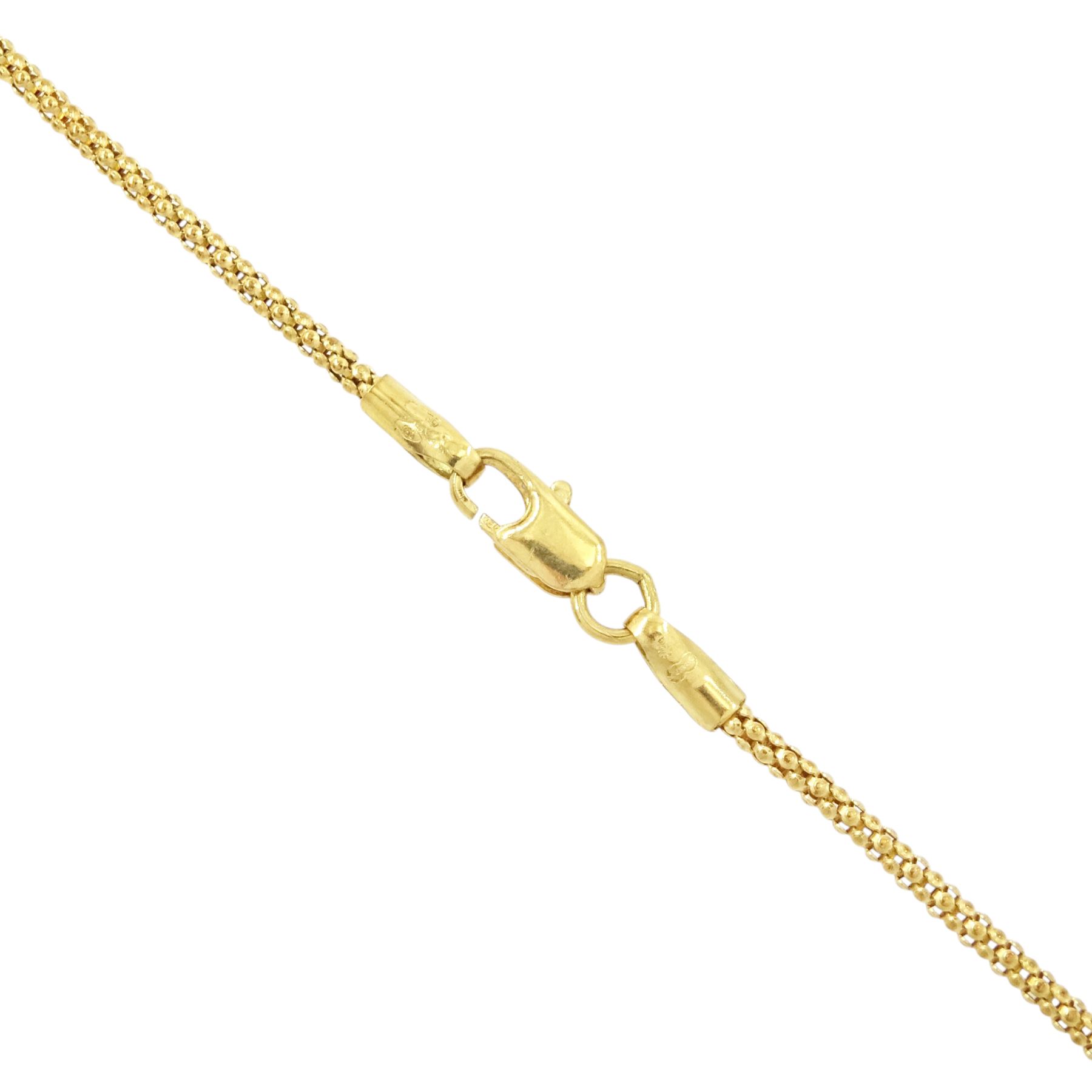 21ct gold Taurus pendant, stamped 875, on 18ct gold popcorn link chain necklace, stamped 750