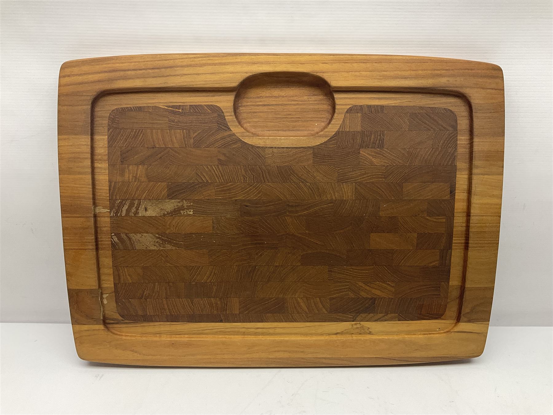 Danish collectables, to include teak tray by Nissen Denmark, ladybird pattern biscuit barrel by Laurids Lonborg and a Stelton stainless steel and wooden cruet set, together with a mid century floral tile trivet