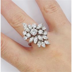 18ct white gold round brilliant cut and marquise cut diamond, stepped design cluster ring, London 1975, total diamond weight approx 3.10 carat