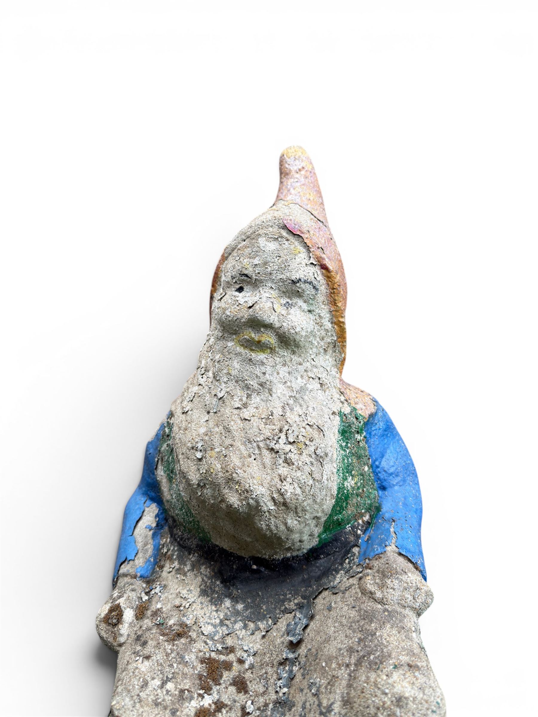 Early large scale composite stone garden gnome, original distressed paint