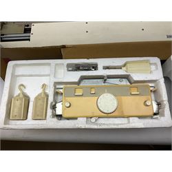  Brother cased knitting machine model KH-890 together with Brother Ribbing attachment model KH-850, knitting machine yarn cones in assorted colours, selection of knitting patterns etc