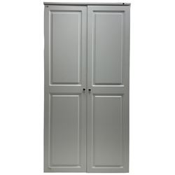 Large white finish sewing cabinet, enclosed by two doors fitted with thread holders and shelves, the interior fitted with shelves and sliding trays, with fold down work surfaces 