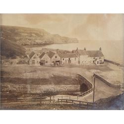 After Frank Meadow Sutcliffe (British 1853-1941): 'Pier Road Whitby', photographic print with facsimile signature 34cm x 44cm; 'Sandsend from the Railway', 19th/early 20th century photograph pub. Poulton No.A.2237, 14cm x 18cm (2) 